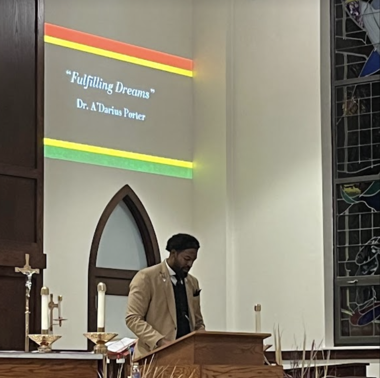 Speech being given by Dr. Adarius Porter at the Black History Month Service and Celebration 